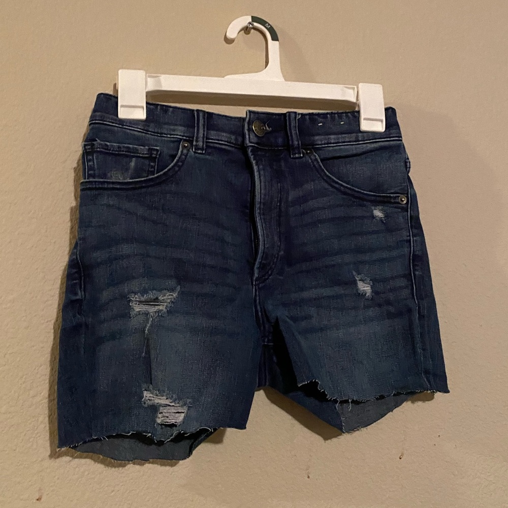 Slightly ripped jean shorts